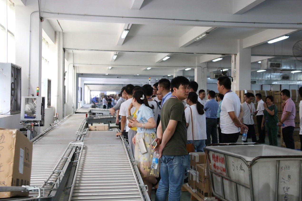 寶開常務副總裁王雷:“新零售環境下的物流中心規劃”主題分享 | UR服飾物流中心迎百余服裝物流經理人現場參觀